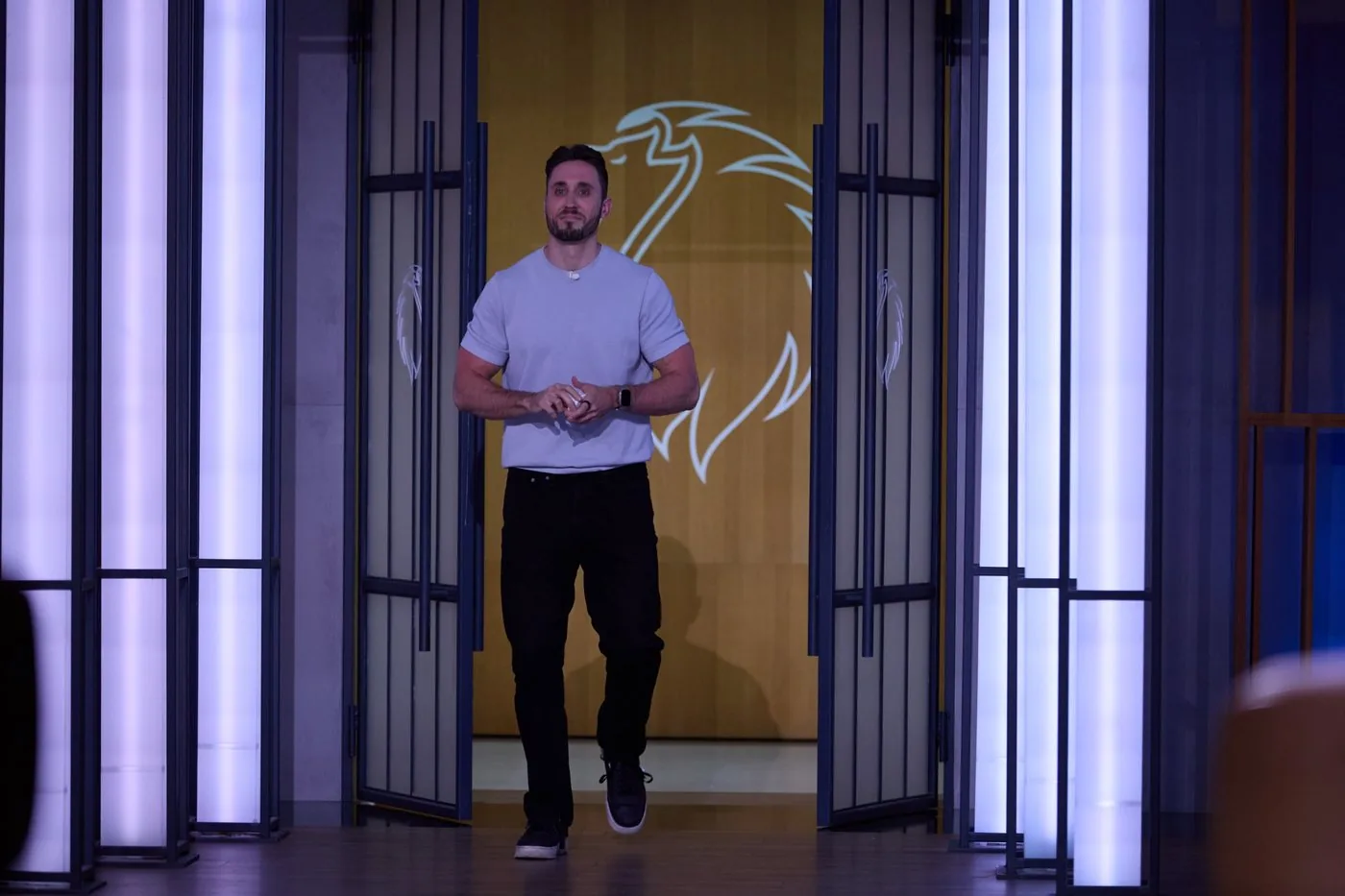 WAVE founder Filip Matějka walking into the Shark Tank Czechia studio.